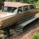 Illustration for article titled A Canadian Turned a Cadillac Brougham Limousine Into a Snowmobile and It's Glorious